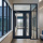 Clear fire-rated glass ceramic installed in a commercial aluminum-framed door and sidelite opening.
