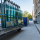 Commercial glass delivery arriving at a prepared construction jobsite staging area.