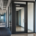Fire-Protective Vs Fire-Resistive Glass: fire-rated glass door and sidelite in an aluminum frame at a commercial interior opening