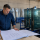 Commercial glazier reviewing Fire-Rated Glass in Dallas, Fort Worth, Texas with door-frame drawings.