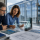How To Choose Low-E Glass For Commercial Construction Projects: glazing professionals comparing Low-E glass samples for a commercial construction project