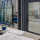 Glazing professional reviewing how to select fire-rated glass products for applicable building-code requirements at a commercial rated opening.