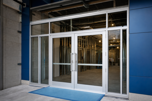Commercial Aluminum Doors And Frames: How To Choose Components For An Entrance System: commercial aluminum doors and frames installed as a coordinated glass sto